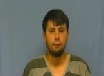 Saline County man accused of attempted murder found hiding in creek