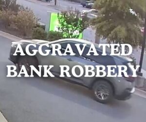 Police say two robbed local bank machine as worker opened it to deposit cash